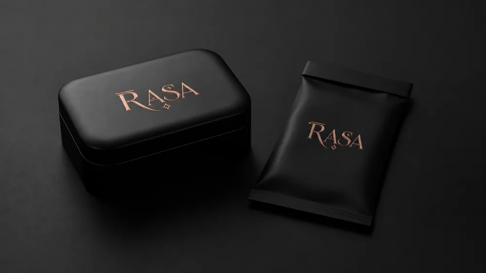 RASA-branded premium packaging finished in rose gold